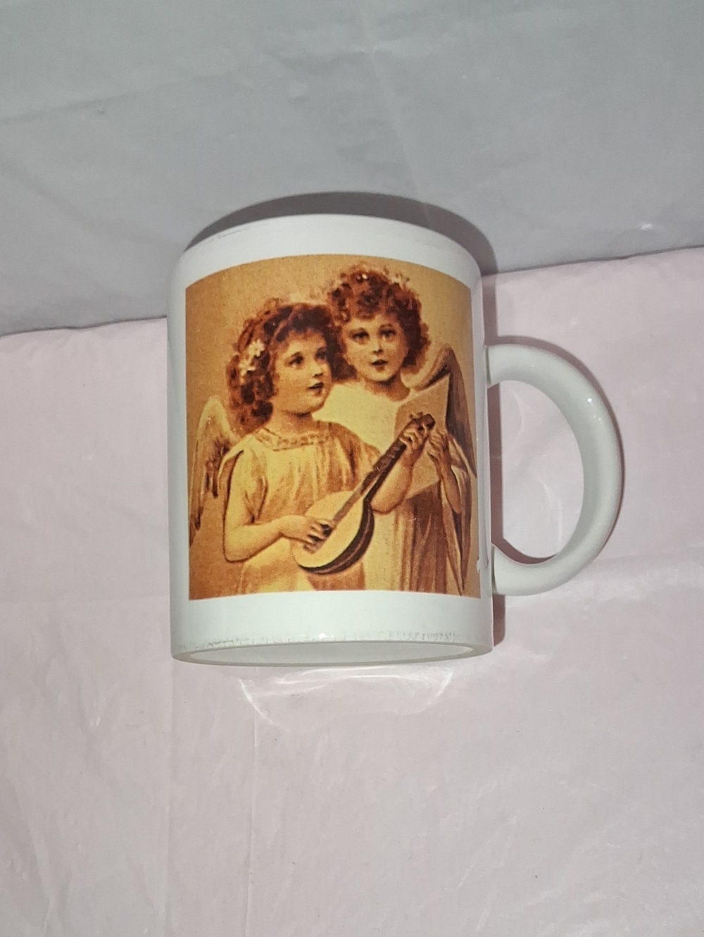 Lovely vintage-style ceramic coffee mug featuring a beautiful, classic illustrat